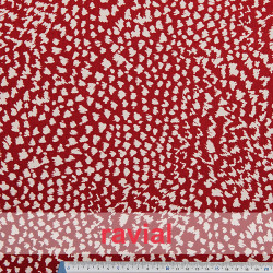RAGNA. Knitted fabric printed with white spots.