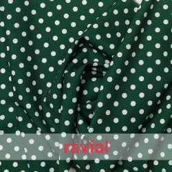 Tejido de crep estampado con lunares de 0,50 cm.
