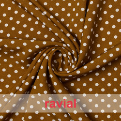 Tejido de crep estampado con lunares de 0,50 cm.