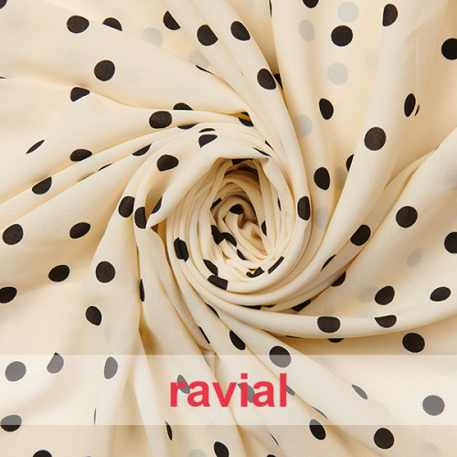 RAGOL. Tejido tipo georgette un poco más tupido y algo elástico. Estampado de lunares 1,00 cm.
