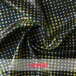 Tejido de punto con elastano y base holograma con estampado de lunares pequeños.