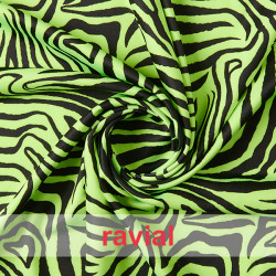 Tejido de punto con estampado cebra flúor.
