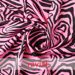Tejido de punto con estampado cebra flúor.