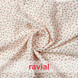 Tejido de bambula con estampado infantil de florecitas.